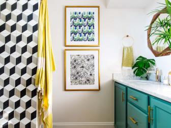 Small bathroom color palettes don't have be limited to whites and grays. In a small space, you can use bright, bold colors and patterns that might be overwhelming in a larger room. This small bathroom from Dabito of Old Brand New is bursting with rich colors, quirky patterns and geometric shapes.