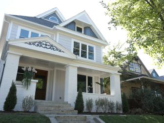 The new front exterior of the home that Mina and Karen renovated, featuring beautfiul white  brick as seen on Good Bones