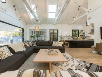 Black and White Living Room with Black and White Pillows on a Black Sectional 