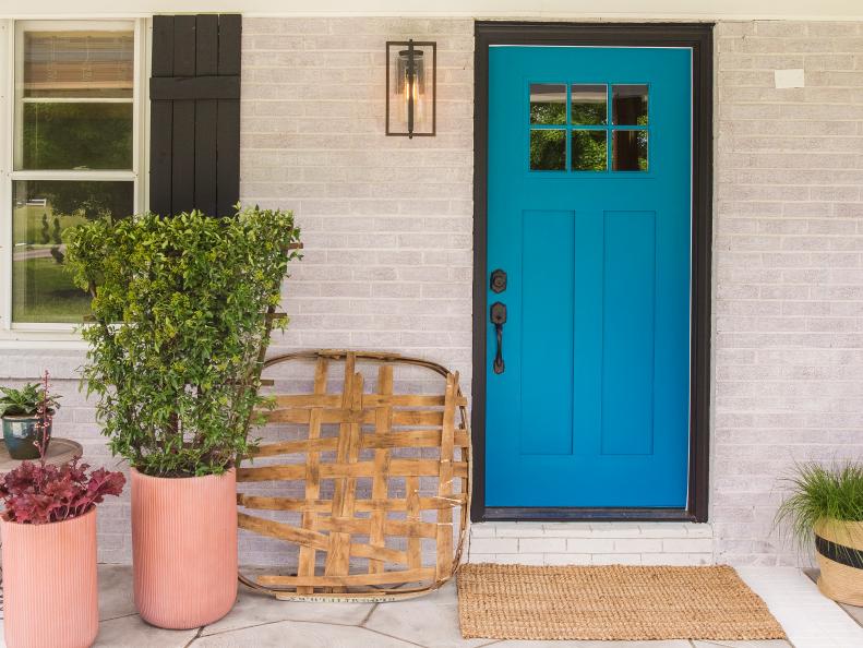 Katie and Trents newly renovated front porch, as seen on Curb Appeal Xtreme.